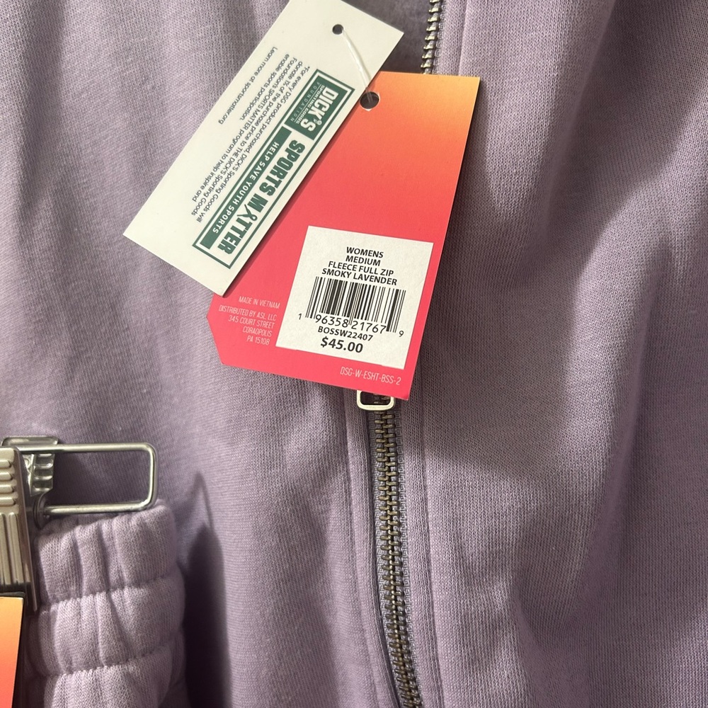 Women’s DSG warm up’s in Smokey Lavender size medium. New with tags